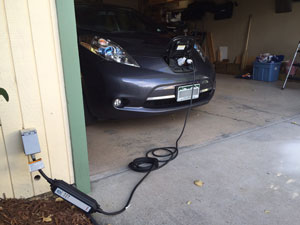 Photo of a vehicle's charging receptacle.