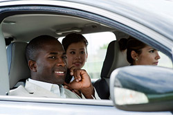 Photo of people car pooling.